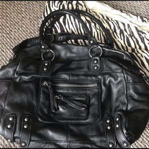 Authentic Linea Pelle Dylan 24HR overnight bag.